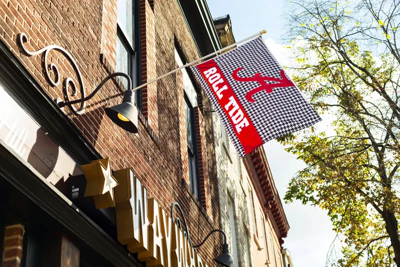 The Roll Tide flag on the front of Wayward on Charles Street